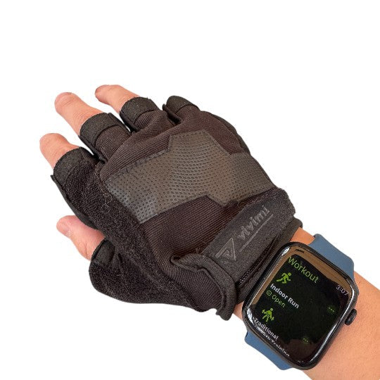 Hand wearing workout gloves while checking Apple Watch Sport bands workout tracking for indoor running.