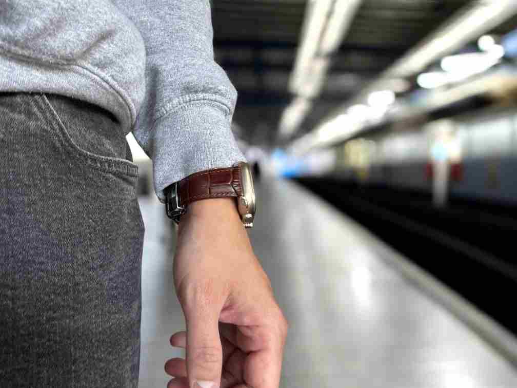 anhem allie leather apple watch band that's alligator embossed pattern in train station