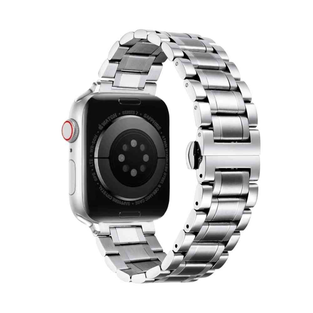 Silver Anhem Lustro Steel Band installed on an Apple Watch, showcasing the polished stainless steel design ideal for style and durability, featuring a classic butterfly buckle. Perfect choice for an Apple Steel Watch band.