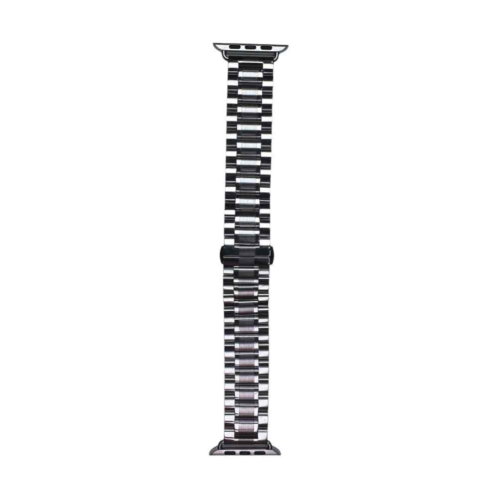 The Silver Anhem Lustro Steel Band displayed vertically, emphasizing the high-quality stainless steel links that create a stunning look for your Apple Watch. A great option for an Apple Steel Watch band.