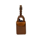 Leather Luggage Tag Holder designed for AirTags for luggage, showcasing premium craftsmanship with a sleek brown finish and a secure slot for the Airtag.