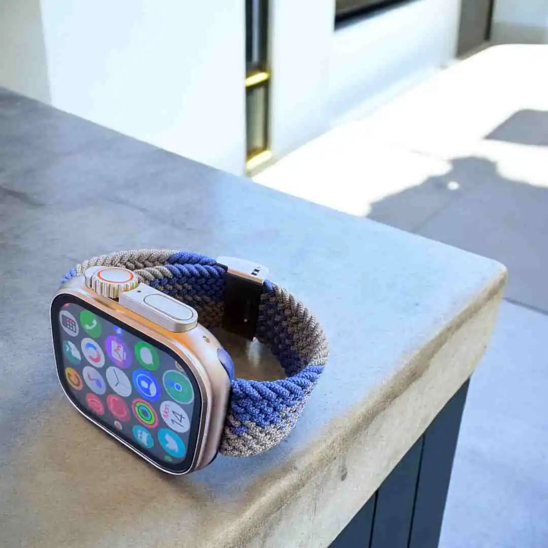Stylish Flex Nylon Band on Apple Watch displayed on a modern concrete surface, part of Anhem's Best Sellers collection of durable and fashionable Apple Watch bands.  Best Selling Straps anhem.myshopify.com