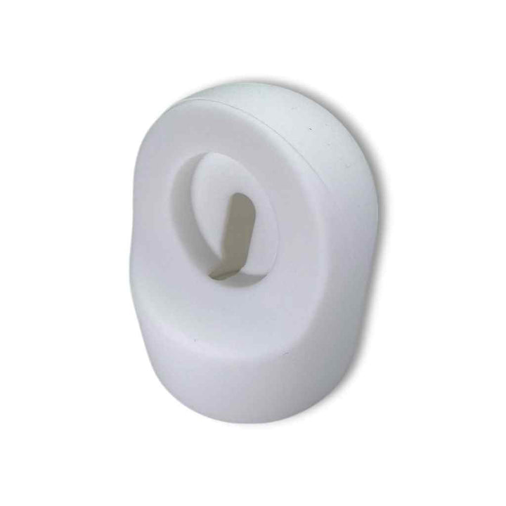 Front view of the Anhem Portable Charging Stand with a minimalist white design, ideal for charging an Apple Watch.