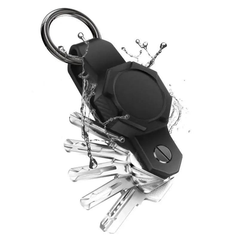 Anhem's Smart Key Case Holder & Organizer for Tag, featuring a sleek design with a black silicone finish, displaying keys and a water splash effect, ideal as an AirTag Keychain Holder.  Smart Key Case Holder & Organizer for Tag  anhem.myshopify.com  Black