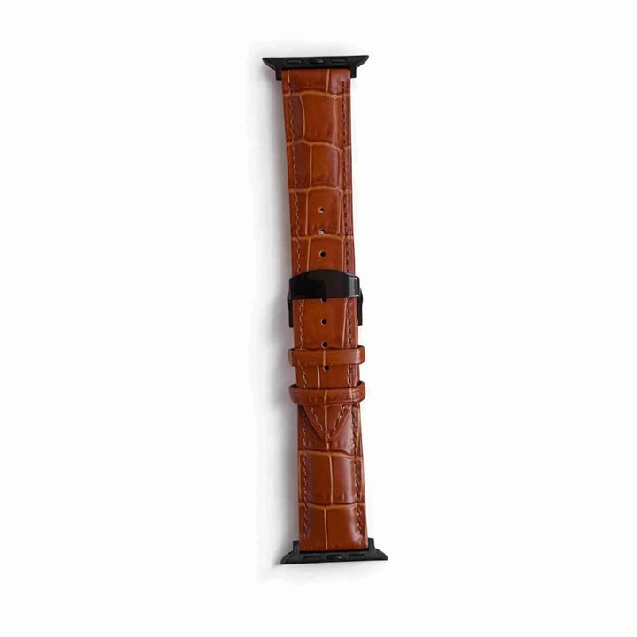 Close-up of Anhem Allie Leather Band in brown color, made from genuine alligator embossed calfskin leather, ideal for enhancing your Apple Watch.  Allie Leather Strap  anhem.myshopify.com  Light Brown / Black Buckle / 38/40/41/42MM (Small Watch)