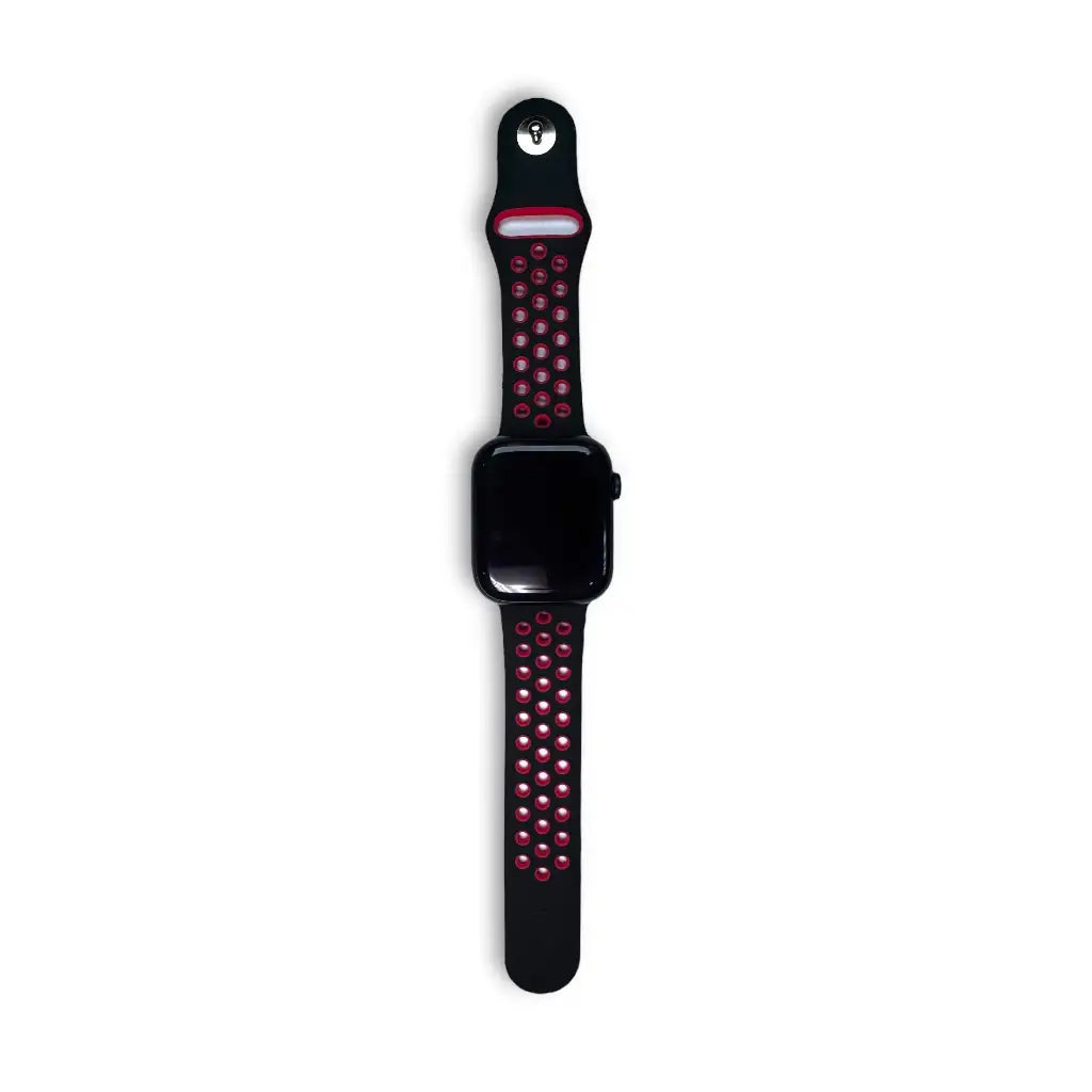 Anhem Aero silicone Apple Watch band in black with red perforated holes for breathability