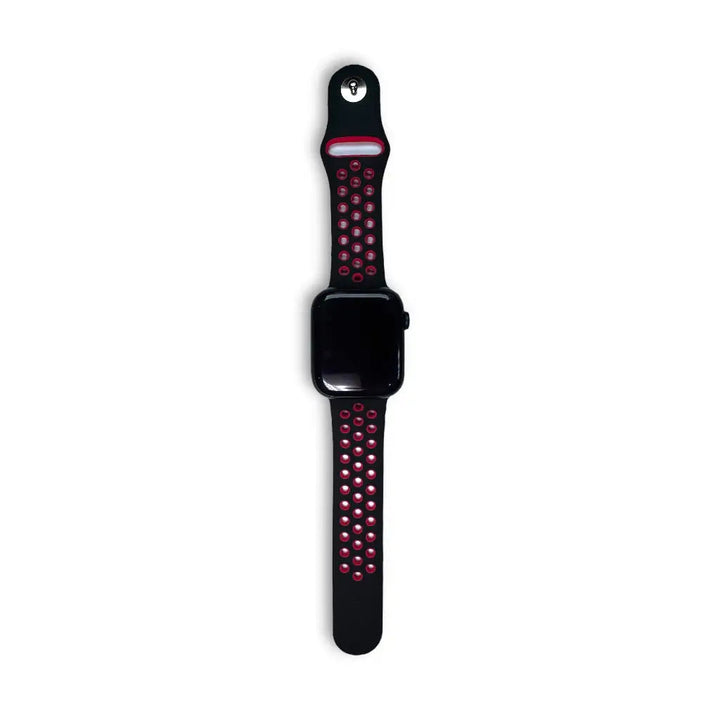 Anhem Aero silicone Apple Watch band in black with red perforated holes for breathability