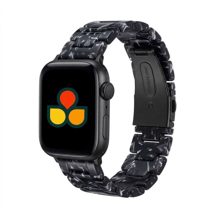 Anhem Amber Resin Strap in black and white marble pattern for Apple Watch with a stainless steel clasp