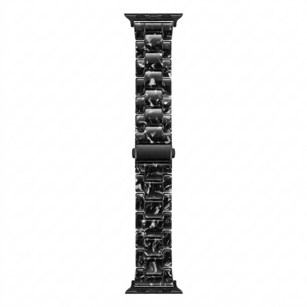 Anhem Amber Resin Apple Watch band in a black and white marbled pattern with a smooth, translucent finish.