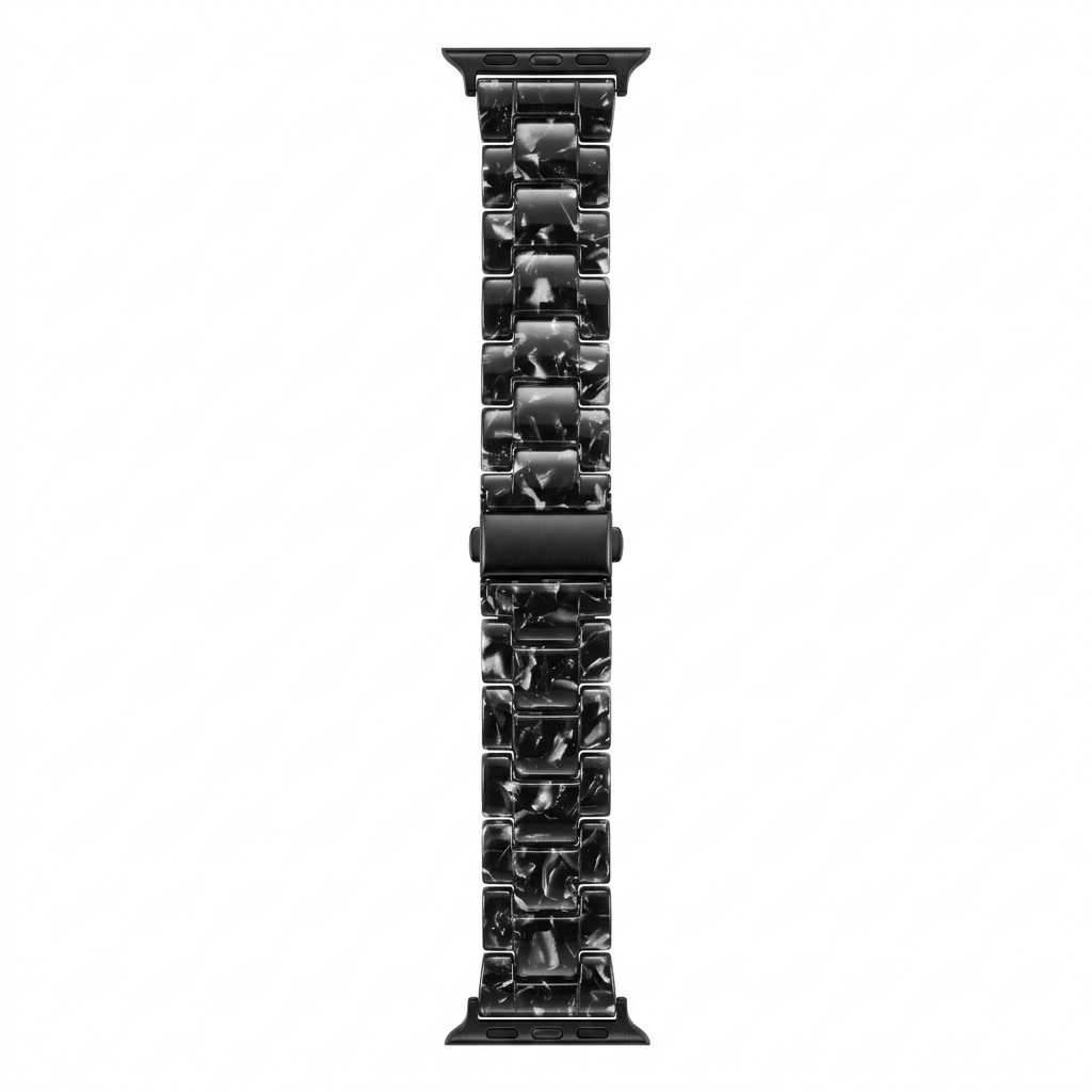 Anhem Amber Resin Apple Watch band in a black and white marbled pattern with a smooth, translucent finish.