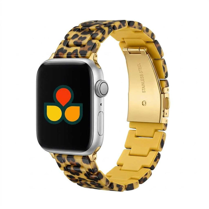 Anhem Amber Resin Apple Watch band featuring a translucent leopard print pattern and stainless steel clasp.