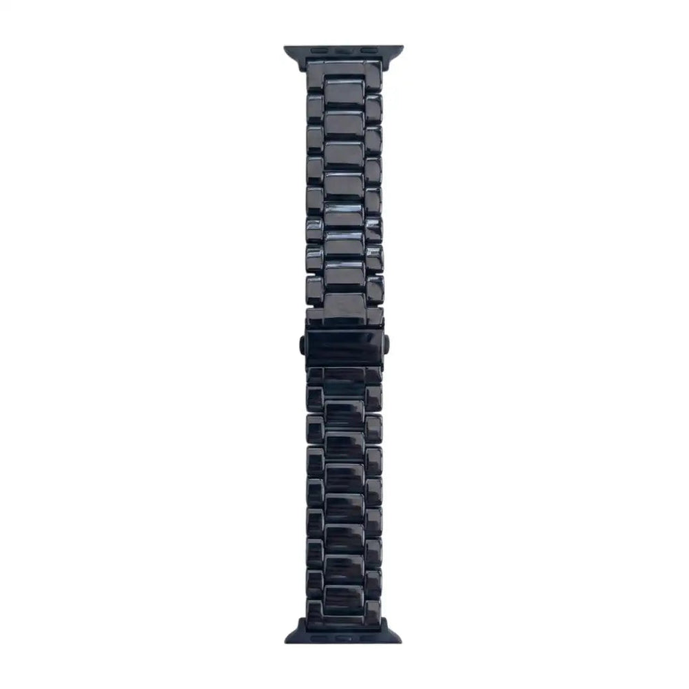 Anhem Classic Ceramic Apple Watch band in black with a polished 3-link design and secure buckle closure.
