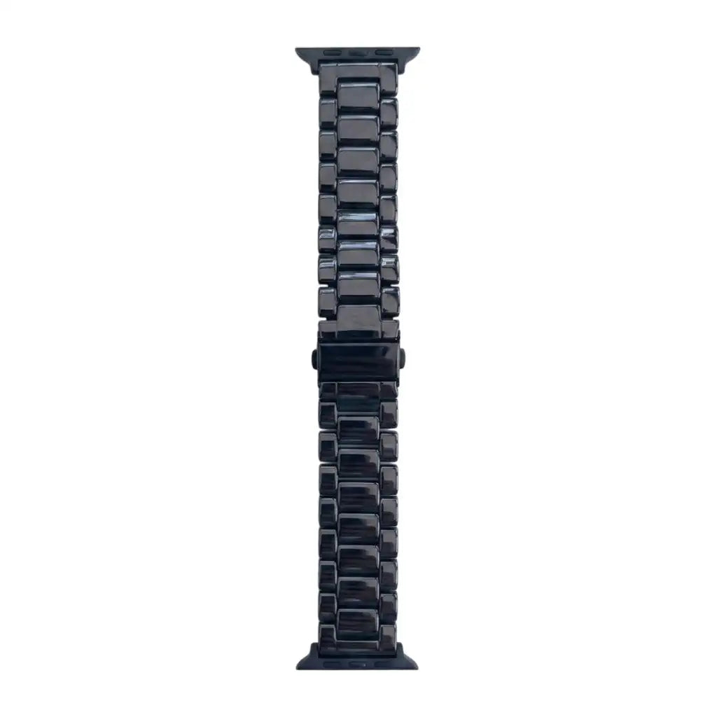 Anhem Classic Ceramic Apple Watch band in black with a polished 3-link design and secure buckle closure.