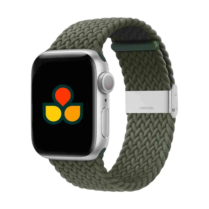 Anhem olive green braided nylon solo loop watch band on a silver Apple Watch, featuring a comfortable stretch fit.
