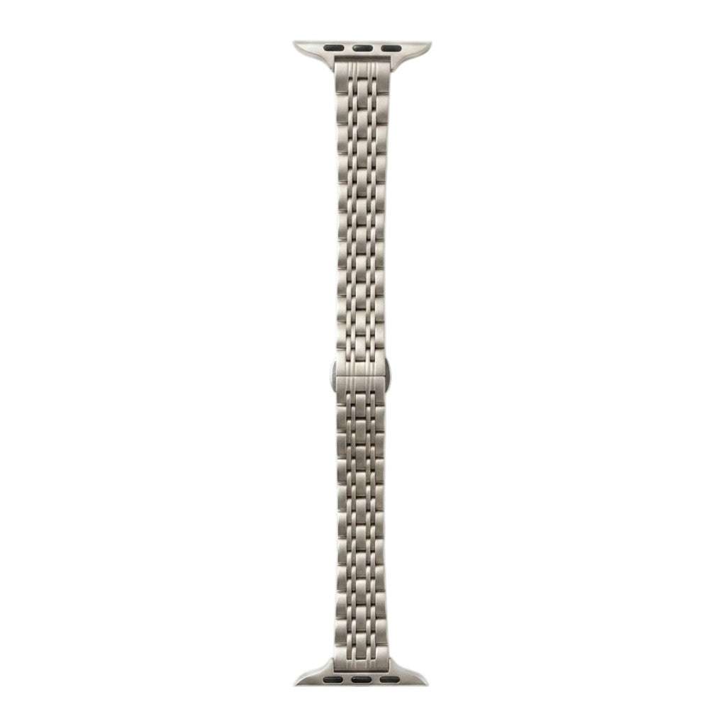 Metallic satin starlight apple watch band on a white background