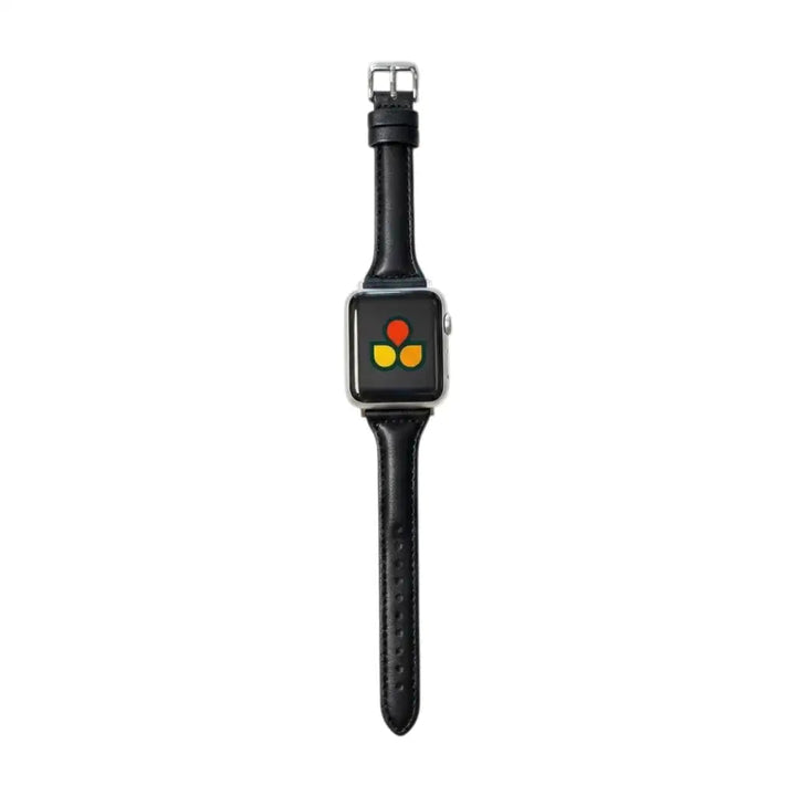 Anhem slim black genuine leather Apple Watch band with a silver buckle, shown attached to an Apple Watch.