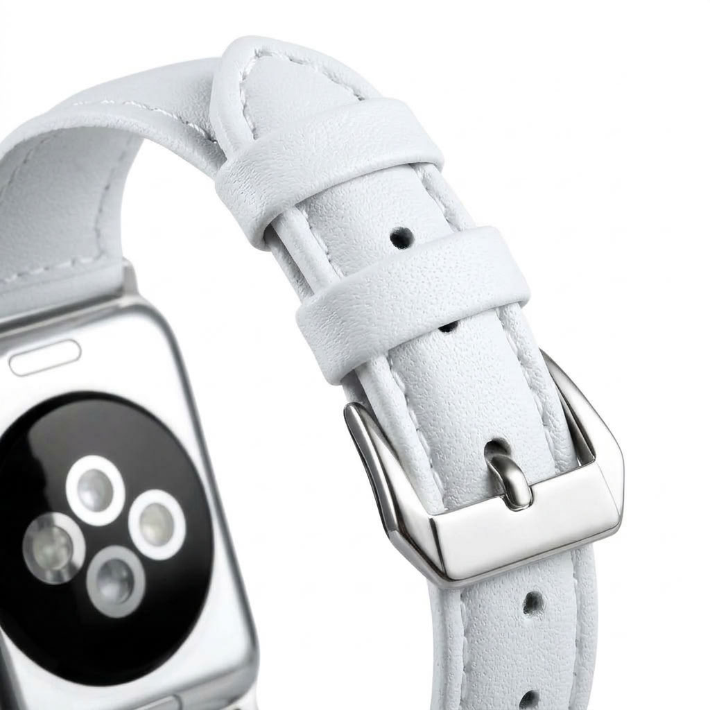 up close view of slim leather apple watch band in white color