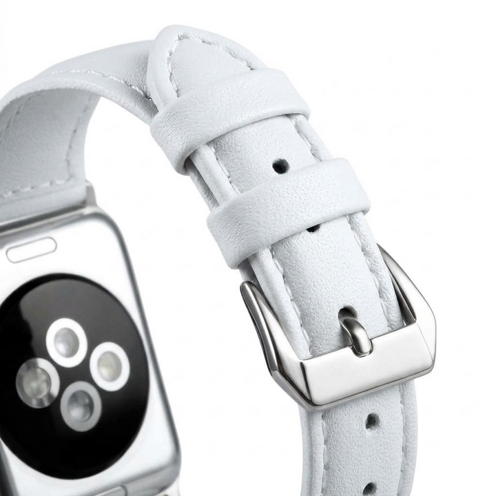 up close view of slim leather apple watch band in white color