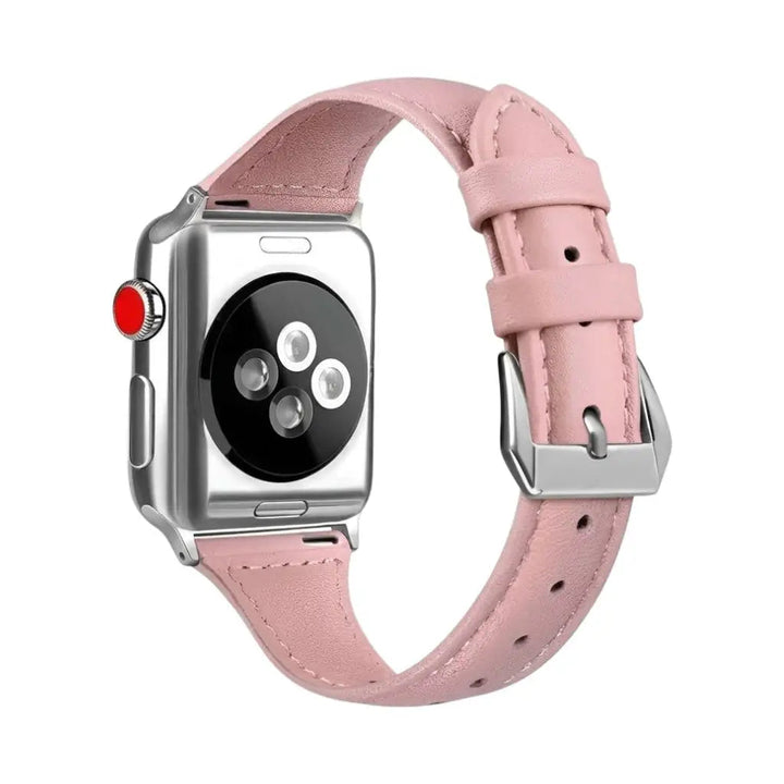 Anhem slim pink genuine leather Apple Watch band with a silver buckle and stitched edges on a silver watch case