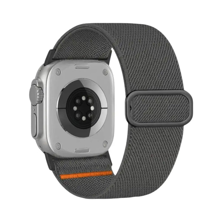 Anhem Ultra Nylon Strap in dark grey on an Apple Watch Ultra, showing the wide elastic band and adjustable buckle.