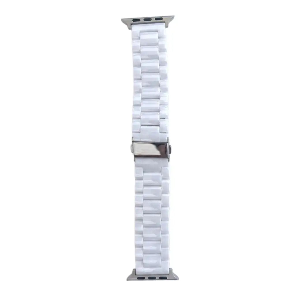 Anhem white ceramic 3-link Apple Watch band with a polished finish and secure metal buckle closure.
