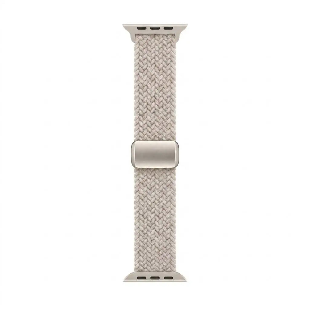 A light starlight woven fabric apple watch band with a silver metal buckle, shown vertically on a plain white background.