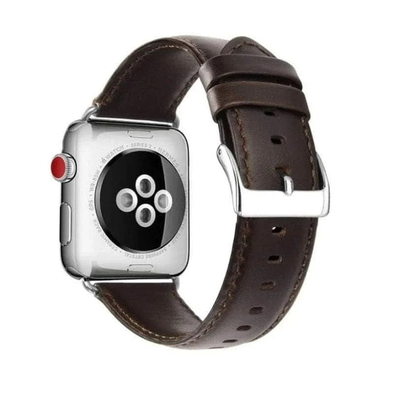 Close-up view of the Anhem Vintage Leather Band on an Apple Watch, highlighting the shiny silver buckle and sleek dark brown leather. Stylish Leather Apple Watch Band.
