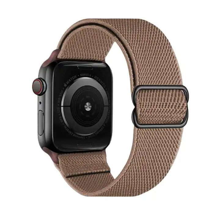 Light Brown Flex Nylon Band by Anhem for Apple Watch, perfect for adding a touch of femininity to your look.  Flex Nylon Strap  anhem.myshopify.com  Light Brown / Black Buckle / 44/45/46/499MM (Large Watch)