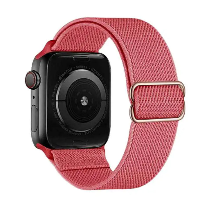 Coral Red Flex Nylon Band by Anhem for Apple Watch, featuring a soft stretchy design for comfort.  Flex Nylon Strap  anhem.myshopify.com  Coral / Rose Gold Buckle / 44/45/46/499MM (Large Watch)