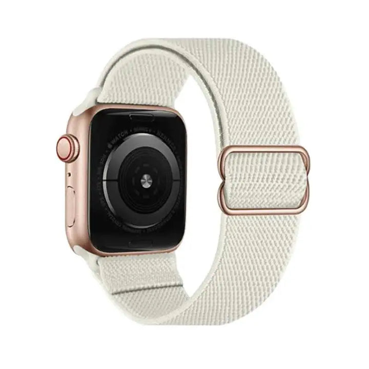 Close-up view of Starlight Flex Nylon Band by Anhem for Apple Watch, showcasing its breathable and stretchy fabric.  Flex Nylon Strap  anhem.myshopify.com  Starlight / Rose Gold Buckle / 44/45/46/499MM (Large Watch)