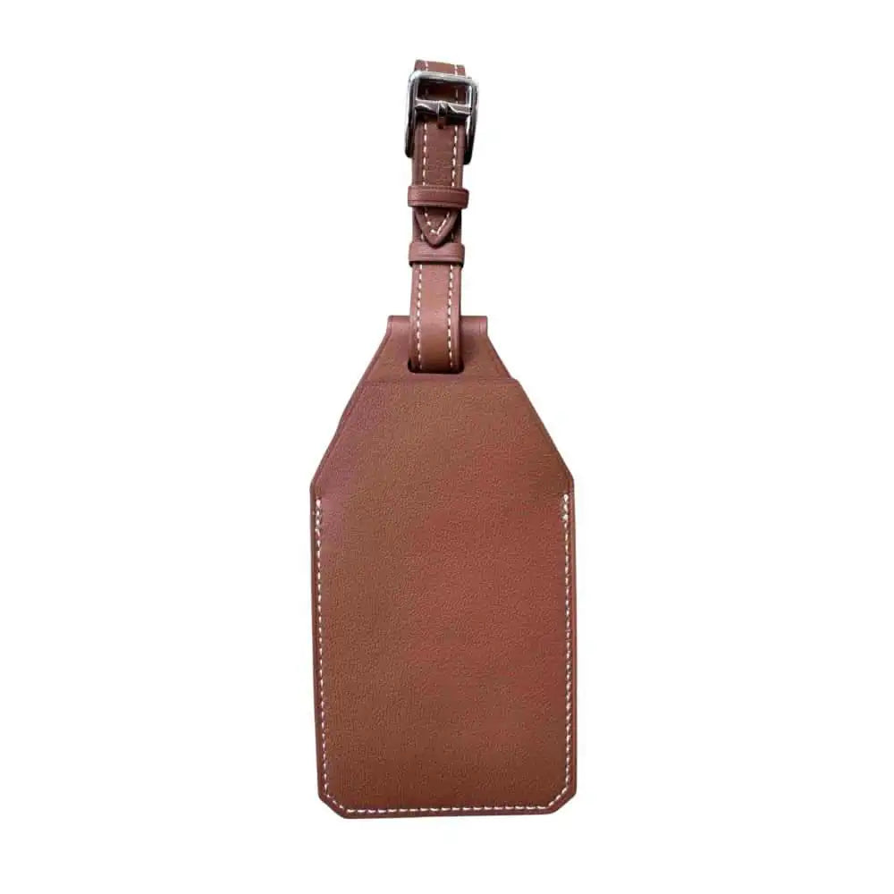 A simple and elegant back view of the Anhem AirTag Luggage Tag & Holder, crafted from durable vegan leather for stylish travel.  Luggage Tag & Holder for Tracker  anhem.myshopify.com
