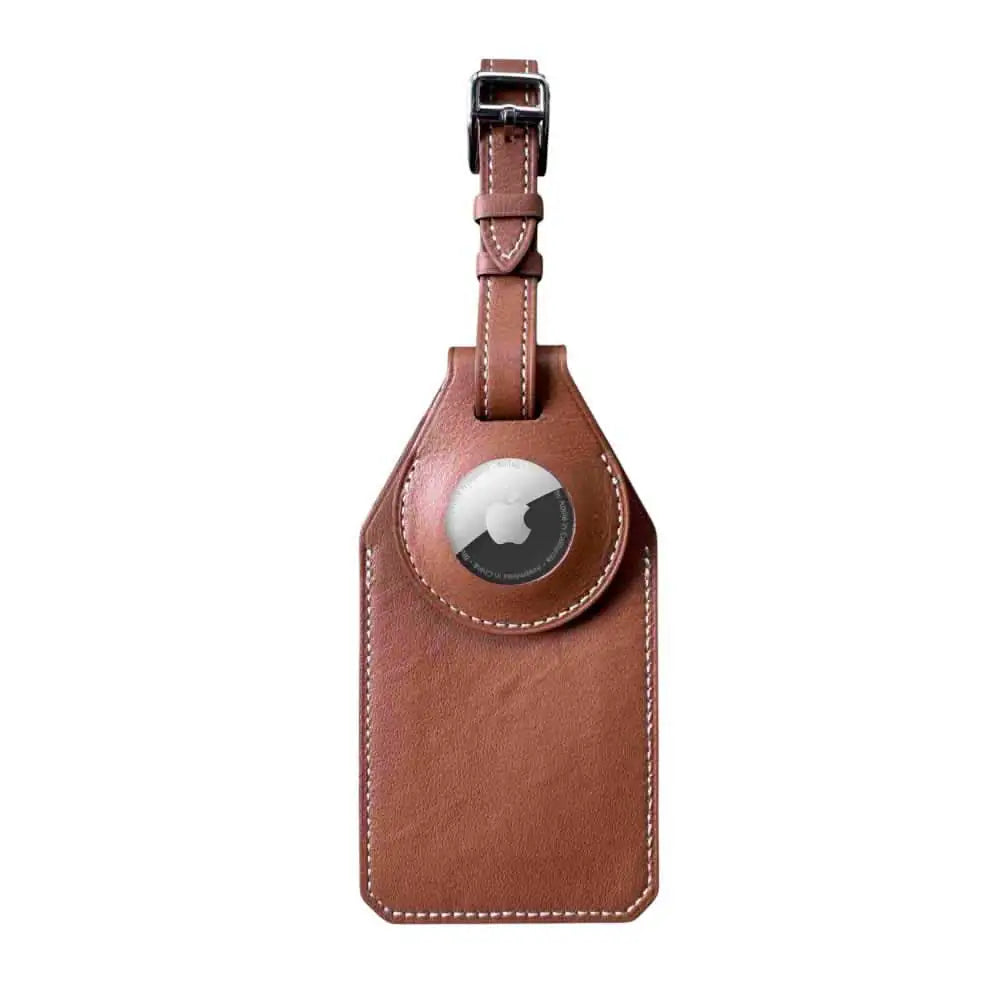 Anhem AirTag Luggage Tag & Holder designed for Apple AirTag, featuring a chic brown vegan leather exterior with an integrated holder for discreet tracking.  Luggage Tag & Holder for Tracker  anhem.myshopify.com  Brown