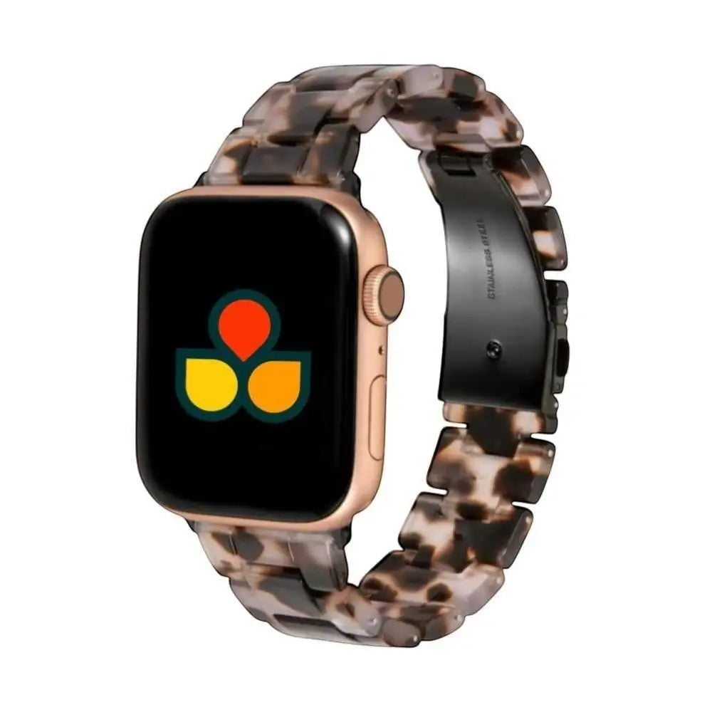Close-up view of the Amber Resin Band by Anhem, designed with a modern tortoise shell pattern, ideal for enhancing your Apple Watch with a unique touch.  Amber Resin Strap  anhem.myshopify.com  Black Pink / 44/45/46/49MM (Large Watch)